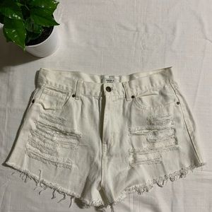 High waisted distressed white denim shorts